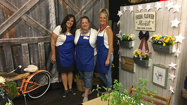 PTO volunteers in their decorated faculty lounge