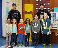 Students pose with Lower Southampton police officers