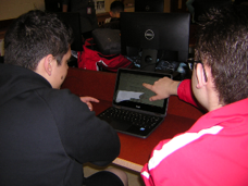 Students at the technology Help Desk at NHS