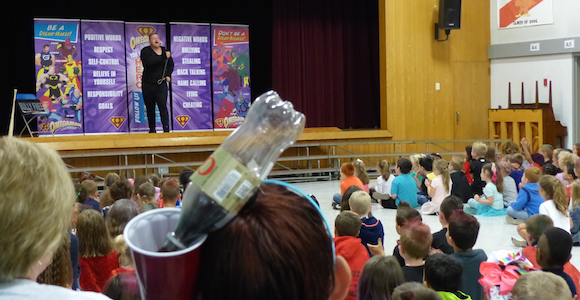 Students watch Omegaman program at Hoover Elementary