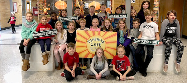 Hoover students with new signs