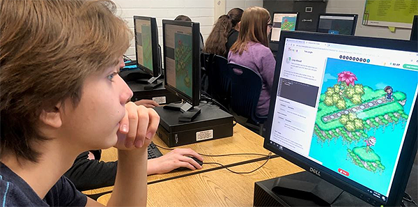 Business class participating in the Hour of Code