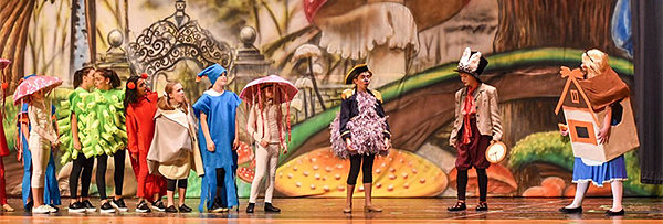 Alice in Wonderland cast on stage