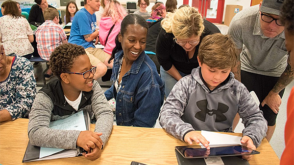 Maple Point students read their biographies to parents