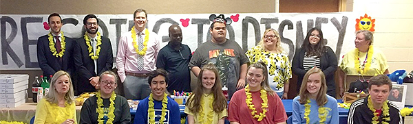 Interact Club members pose with Matthew during the Sunshine Foundation reveal