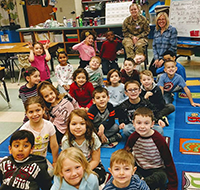 Macey Smith with a class at Walter Miller Elementary School