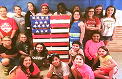 Students with American flag pallette