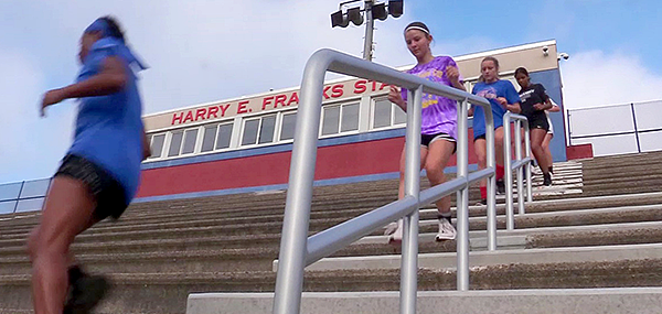 Runners step past new stadium rails at Neshaminy HS