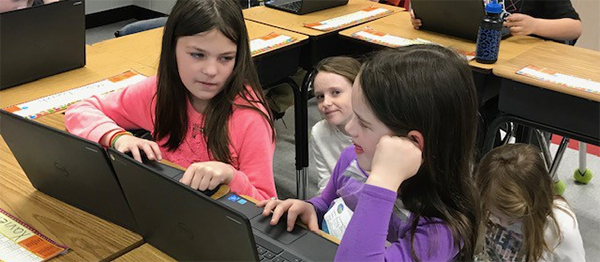 Tawanka buddies work on Chromebooks