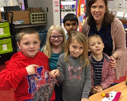 Students eating grapes