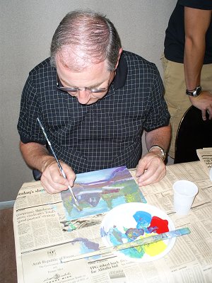 Mr. Robb showing off in our Art class!