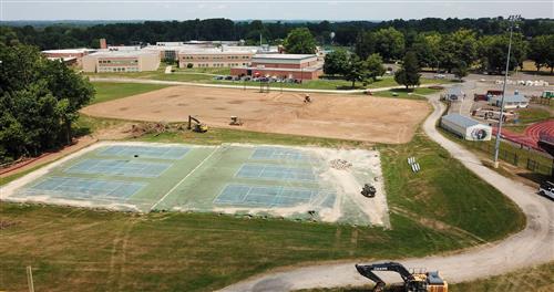 Aerial of tennis courts and multipurpose field